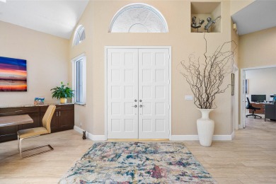 Enjoy stunning golf course & lake views from this 3BR, 21/2BA on Indian Spring Golf and Country Club in Florida - for sale on GolfHomes.com, golf home, golf lot