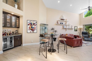 Enjoy stunning golf course & lake views from this 3BR, 21/2BA on Indian Spring Golf and Country Club in Florida - for sale on GolfHomes.com, golf home, golf lot