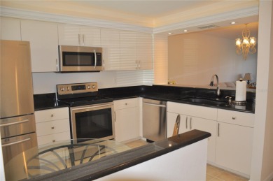 If you are looking for a turnkey, fully furnished, ground floor on Saint Andrews South Golf Club in Florida - for sale on GolfHomes.com, golf home, golf lot