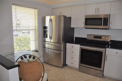 If you are looking for a turnkey, fully furnished, ground floor on Saint Andrews South Golf Club in Florida - for sale on GolfHomes.com, golf home, golf lot