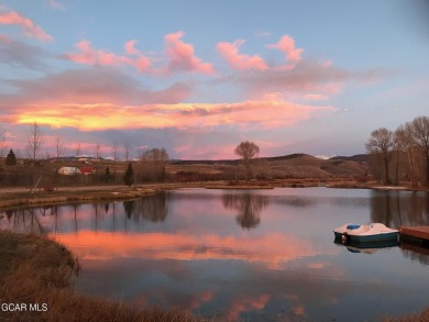 Discover the charm of mountain living with this two-bedroom, 2 on Grand Elk Ranch and Club in Colorado - for sale on GolfHomes.com, golf home, golf lot