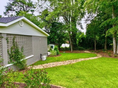 This beautifully remodeled home offers charm, modern convenience on Pineview Country Club in Alabama - for sale on GolfHomes.com, golf home, golf lot
