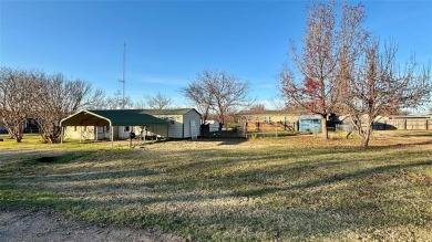 Welcome to Lake Fork Living! This charming 3-bedroom, 2-bathroom on Links At Lands End in Texas - for sale on GolfHomes.com, golf home, golf lot