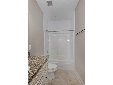 Located just across the street from Lakewood Golf Course, this on Lakewood Golf Course in Alabama - for sale on GolfHomes.com, golf home, golf lot