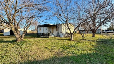 Welcome to Lake Fork Living! This charming 3-bedroom, 2-bathroom on Links At Lands End in Texas - for sale on GolfHomes.com, golf home, golf lot