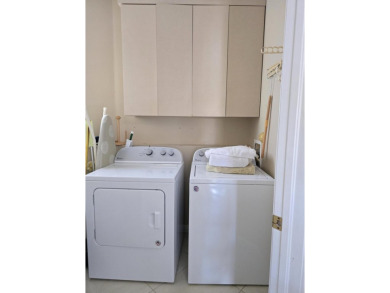 Beautiful 3br/3 house with a private yard overlooking a lake and on  in Florida - for sale on GolfHomes.com, golf home, golf lot