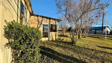 Welcome to Lake Fork Living! This charming 3-bedroom, 2-bathroom on Links At Lands End in Texas - for sale on GolfHomes.com, golf home, golf lot