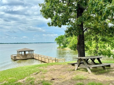 Welcome to Lake Fork Living! This charming 3-bedroom, 2-bathroom on Links At Lands End in Texas - for sale on GolfHomes.com, golf home, golf lot