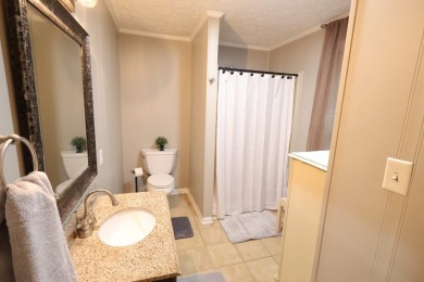 This beautifully remodeled home offers charm, modern convenience on Pineview Country Club in Alabama - for sale on GolfHomes.com, golf home, golf lot