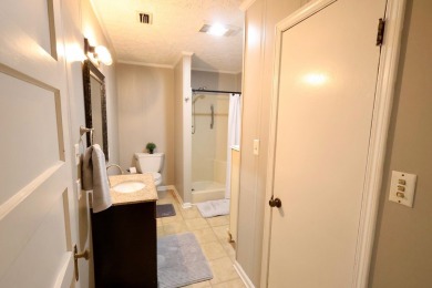 This beautifully remodeled home offers charm, modern convenience on Pineview Country Club in Alabama - for sale on GolfHomes.com, golf home, golf lot
