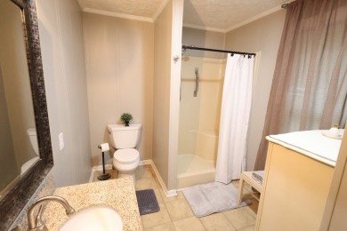 This beautifully remodeled home offers charm, modern convenience on Pineview Country Club in Alabama - for sale on GolfHomes.com, golf home, golf lot