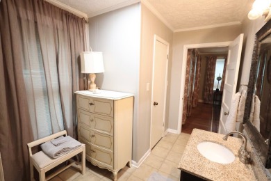 This beautifully remodeled home offers charm, modern convenience on Pineview Country Club in Alabama - for sale on GolfHomes.com, golf home, golf lot