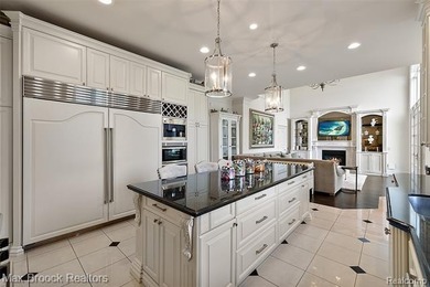 Welcome to a truly exceptional residence that redefines on Oakhurst Golf and Country Club in Michigan - for sale on GolfHomes.com, golf home, golf lot