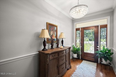 This beautifully maintained 4-bedroom, 2-bath gem nestled in the on Annandale Golf Club in Mississippi - for sale on GolfHomes.com, golf home, golf lot
