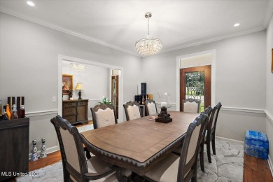 This beautifully maintained 4-bedroom, 2-bath gem nestled in the on Annandale Golf Club in Mississippi - for sale on GolfHomes.com, golf home, golf lot