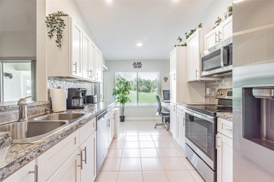 WELCOME TO FLORIDA living at its best!  This beautifully on Tampa Bay Golf and Country Club in Florida - for sale on GolfHomes.com, golf home, golf lot