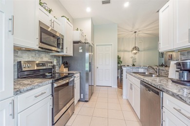WELCOME TO FLORIDA living at its best!  This beautifully on Tampa Bay Golf and Country Club in Florida - for sale on GolfHomes.com, golf home, golf lot