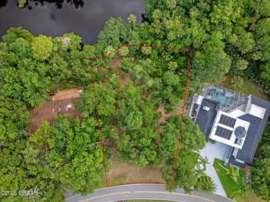 Tucked inside one of Florida's most distinctive GATED on Spruce Creek Golf Club in Florida - for sale on GolfHomes.com, golf home, golf lot