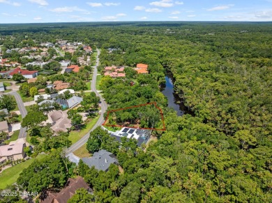 Tucked inside one of Florida's most distinctive GATED on Spruce Creek Golf Club in Florida - for sale on GolfHomes.com, golf home, golf lot