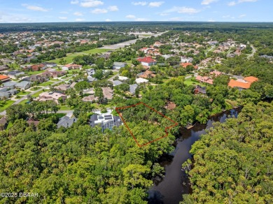 Tucked inside one of Florida's most distinctive GATED on Spruce Creek Golf Club in Florida - for sale on GolfHomes.com, golf home, golf lot