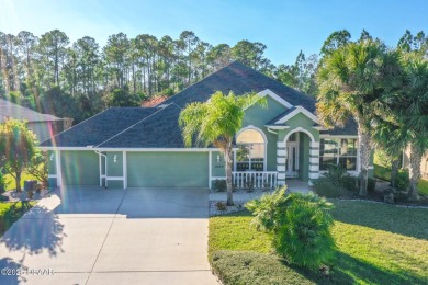 Welcome to this beautifully maintained 4-bedroom, 2-bathroom on Plantation Bay Golf and Country Club in Florida - for sale on GolfHomes.com, golf home, golf lot