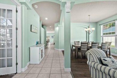 Welcome to this beautifully maintained 4-bedroom, 2-bathroom on Plantation Bay Golf and Country Club in Florida - for sale on GolfHomes.com, golf home, golf lot
