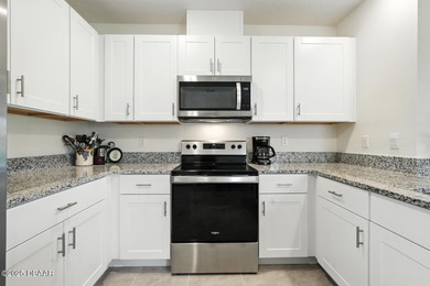 Discover the exceptional value of this pristine 2023 DR Horton on Halifax Plantation Golf Club in Florida - for sale on GolfHomes.com, golf home, golf lot