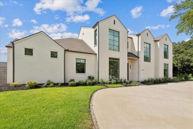 Discover unparalleled luxury in this Alexander Hunt custom on Hackberry Creek Country Club in Texas - for sale on GolfHomes.com, golf home, golf lot