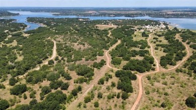 Discover this .33-acre lot near Brownwood Lake and The Hideout on Hideout Golf Club and Resort  in Texas - for sale on GolfHomes.com, golf home, golf lot