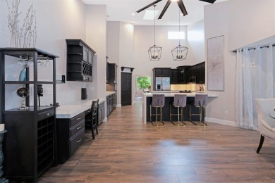 Just 4 min to WEF, this exceptionally secluded Tennis Court on The Wanderers Club in Florida - for sale on GolfHomes.com, golf home, golf lot