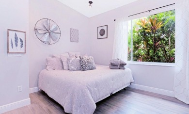 Just 4 min to WEF, this exceptionally secluded Tennis Court on The Wanderers Club in Florida - for sale on GolfHomes.com, golf home, golf lot