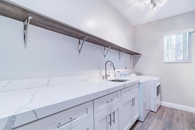 Just 4 min to WEF, this exceptionally secluded Tennis Court on The Wanderers Club in Florida - for sale on GolfHomes.com, golf home, golf lot