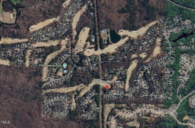 Premier, highly sought-after lot in the golf and nature on The Preserve At Jordan Lake Golf Club in North Carolina - for sale on GolfHomes.com, golf home, golf lot