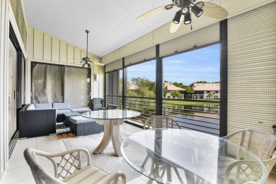 Stunning lake views are the showstopping feature of this on Boca Delray Golf and Country Club in Florida - for sale on GolfHomes.com, golf home, golf lot