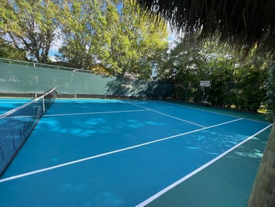 Just 4 min to WEF, this exceptionally secluded Tennis Court on The Wanderers Club in Florida - for sale on GolfHomes.com, golf home, golf lot