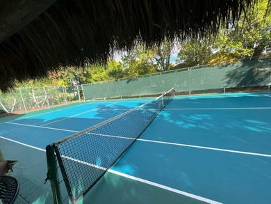 Just 4 min to WEF, this exceptionally secluded Tennis Court on The Wanderers Club in Florida - for sale on GolfHomes.com, golf home, golf lot