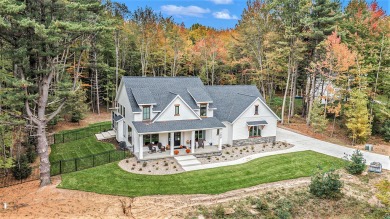 This to-be-built custom home by award-winning North Cove homes on Ravines Golf Club in Michigan - for sale on GolfHomes.com, golf home, golf lot