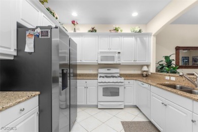 This townhouse has a SPECTAULAR WATER VIEW and is move in ready on Verandah Golf Course and Club in Florida - for sale on GolfHomes.com, golf home, golf lot