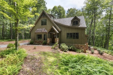 Welcome to this charming custom cottage, nestled among lush on Natures Walk At Chinquapin in North Carolina - for sale on GolfHomes.com, golf home, golf lot