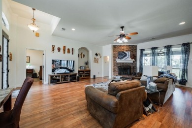 BEAUTIFUL STONE AND BRICK HOME on the par 3, 14th hole of the on Pecan Plantation Country Club in Texas - for sale on GolfHomes.com, golf home, golf lot