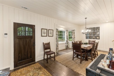 Welcome to this charming custom cottage, nestled among lush on Natures Walk At Chinquapin in North Carolina - for sale on GolfHomes.com, golf home, golf lot