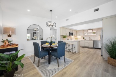 Step into this fully reimagined home in Mutual 5, where modern on Leisure World Seal Beach Golf Course in California - for sale on GolfHomes.com, golf home, golf lot