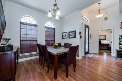 BEAUTIFUL STONE AND BRICK HOME on the par 3, 14th hole of the on Pecan Plantation Country Club in Texas - for sale on GolfHomes.com, golf home, golf lot