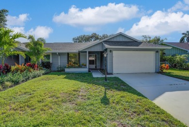 Welcome to your tropical retreat in the heart of Hobe Sound! on Eagle Wood Golf Course in Florida - for sale on GolfHomes.com, golf home, golf lot