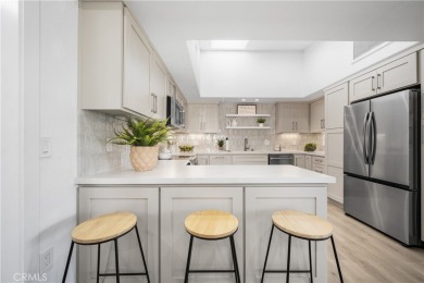 Step into this fully reimagined home in Mutual 5, where modern on Leisure World Seal Beach Golf Course in California - for sale on GolfHomes.com, golf home, golf lot