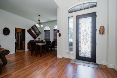 BEAUTIFUL STONE AND BRICK HOME on the par 3, 14th hole of the on Pecan Plantation Country Club in Texas - for sale on GolfHomes.com, golf home, golf lot