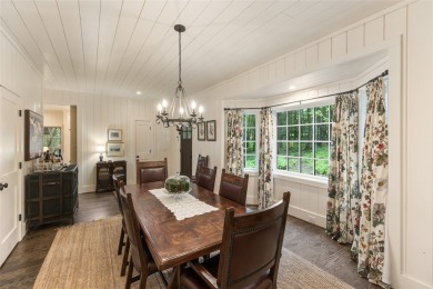 Welcome to this charming custom cottage, nestled among lush on Natures Walk At Chinquapin in North Carolina - for sale on GolfHomes.com, golf home, golf lot