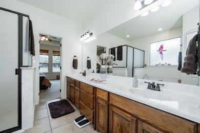 BEAUTIFUL STONE AND BRICK HOME on the par 3, 14th hole of the on Pecan Plantation Country Club in Texas - for sale on GolfHomes.com, golf home, golf lot