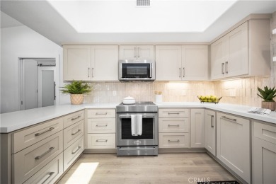 Step into this fully reimagined home in Mutual 5, where modern on Leisure World Seal Beach Golf Course in California - for sale on GolfHomes.com, golf home, golf lot