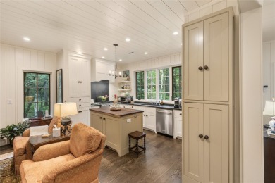 Welcome to this charming custom cottage, nestled among lush on Natures Walk At Chinquapin in North Carolina - for sale on GolfHomes.com, golf home, golf lot